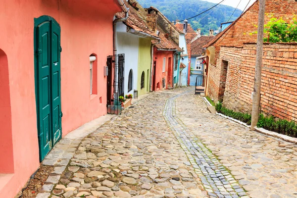 Medieval street view in Sighisoara founded by saxon colonists in — Stock Photo, Image
