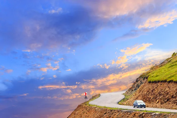 Mountain road and beautiful sunset — Stock Photo, Image