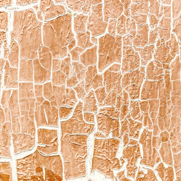 Cracked paint on the concrete wall — Stock Photo, Image