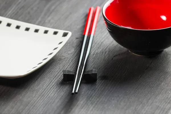 Two chopsticks on wooden background — Stock Photo, Image