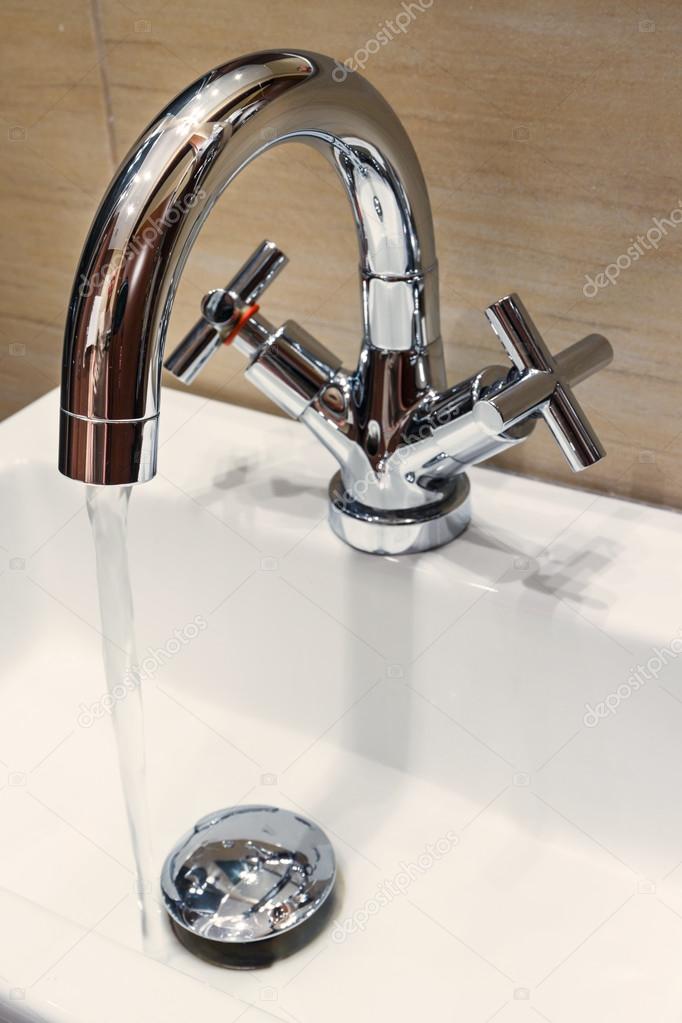 water tap with modern design in bathroom