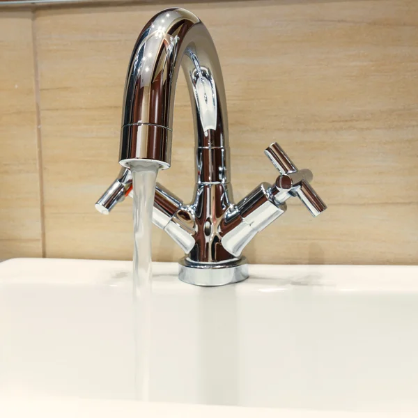 Water tap with modern design in bathroom — Stock Photo, Image