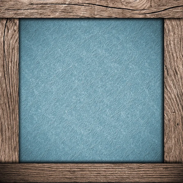 Houten frame met blauw papier — Stockfoto