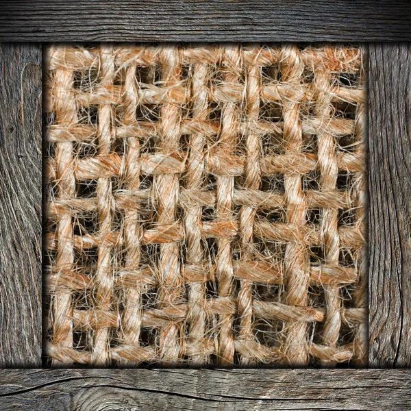 Background of crumpled burlap with wood frame — Stock Photo, Image