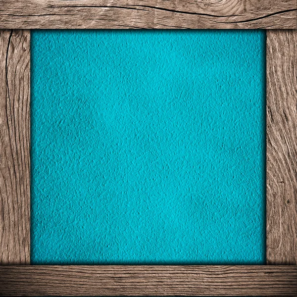 Houten frame met blauw papier — Stockfoto