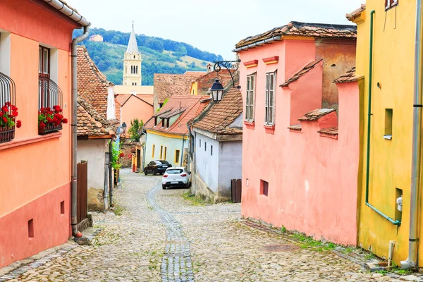 Medieval street view in Sighisoara founded by saxon colonists in — Stock Photo, Image