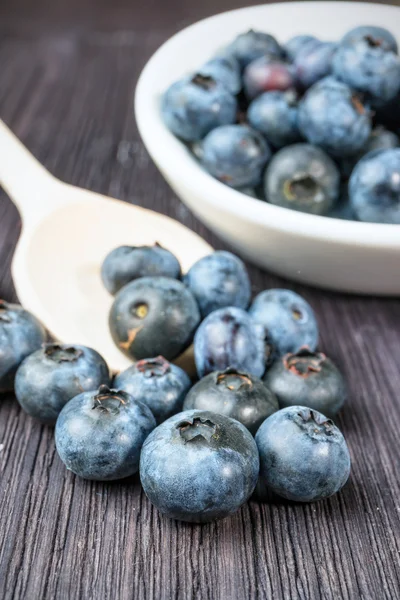 Blueberry on wooden board — Stock Photo, Image