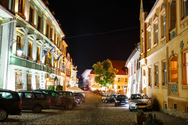 SIGHISOARA, ROMANIA - JULY 07: Night view of historic town Sighisoara on July 07, 2015. City in which was born Vlad Tepes, Dracula — Stock Photo, Image
