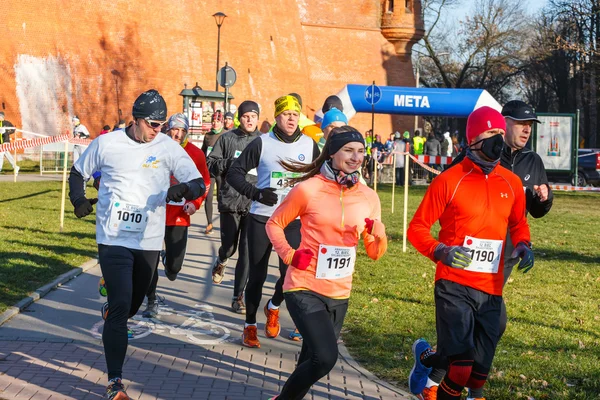 Krakow, Poland - December 31, 2015: 12th New Year's Eve Race in Krakow. The people running dressed in funny costumes