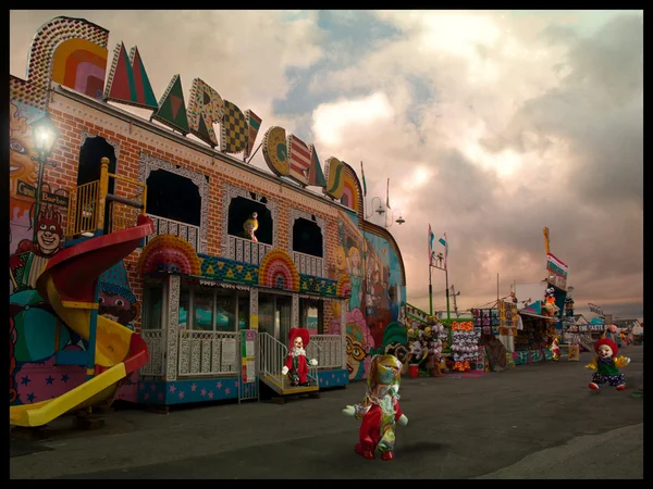 Little clowns at the fair — Stock Photo, Image