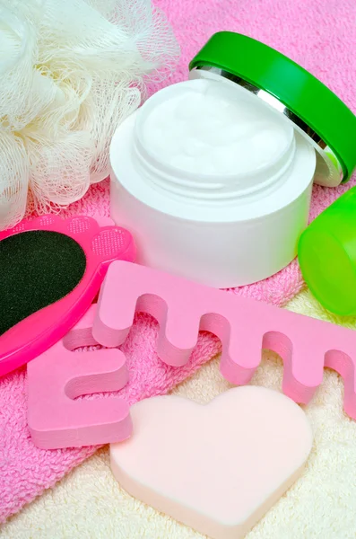 Foot care. Pedicure set on a pink towel. — Stock Photo, Image