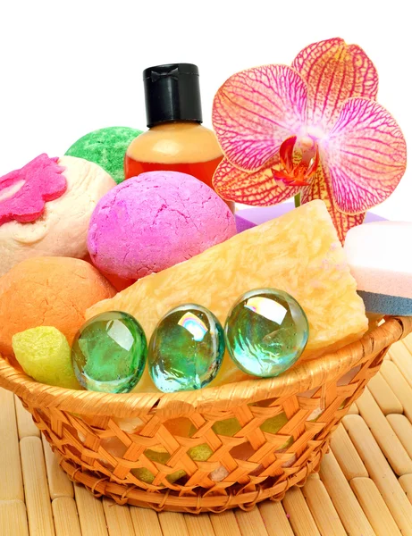 Soap, gel, bath bombs, sponges in the basket — Stock Photo, Image