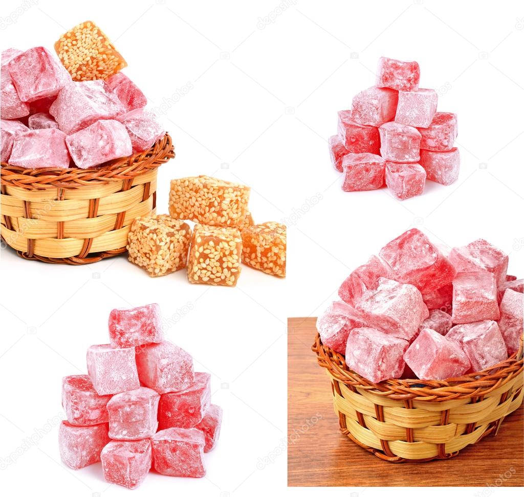 Turkish sweet delights in icing sugar in the basket isolated