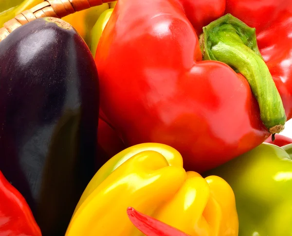Sweet pepper, aubergine, chili pepper in the basket — Stock Photo, Image