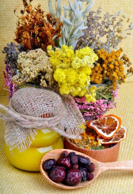 Medicinal herbs with honey clipart