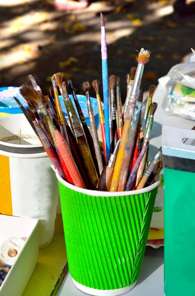 Paint brushes in a glass. — Stock Photo, Image