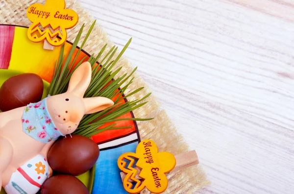 Easter decoration  bunny with chocolate eggs. — Stock Photo, Image