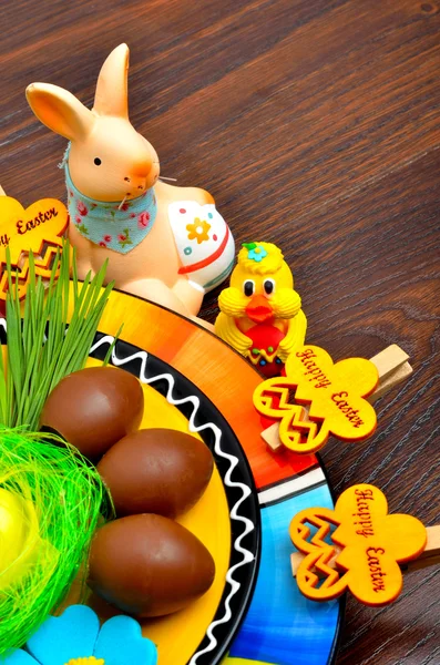 Easter decoration  bunny with chocolate eggs. — Stock Photo, Image