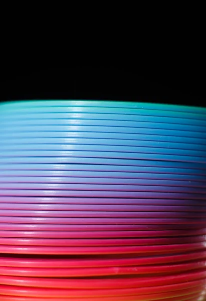 Plastic colored rainbow texture. Toy rainbow.