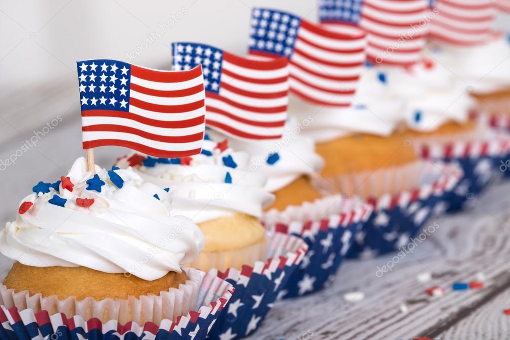 Row of patriotic cupcakes with American flags