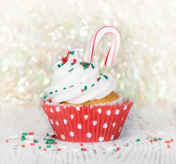 Christmas cupcake with candy cane — Stock Photo, Image