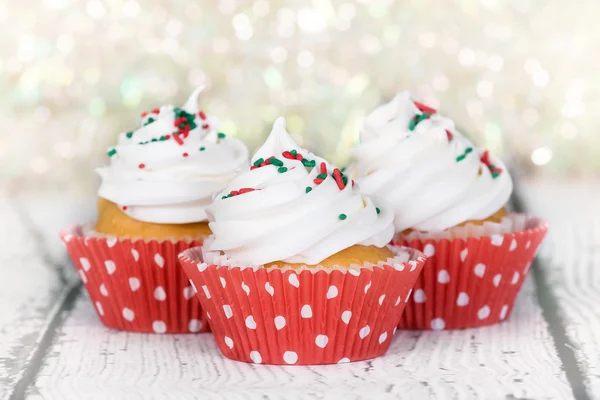 Christmas cupcakes with vanilla frosting — Stock Photo, Image