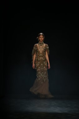 model walks the runway wearing Marchesa Fall 2016