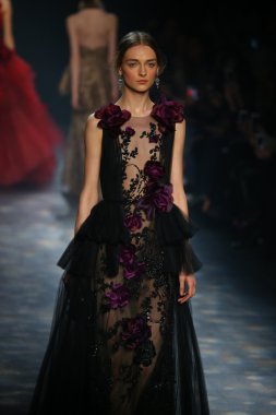 model walks the runway wearing Marchesa Fall 2016