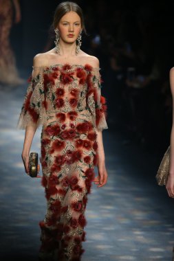 model walks the runway wearing Marchesa Fall 2016