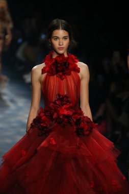model walks the runway wearing Marchesa Fall 2016