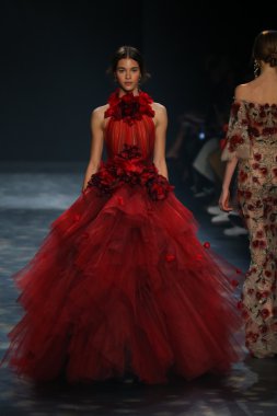 model walks the runway wearing Marchesa Fall 2016