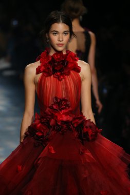 model walks the runway wearing Marchesa Fall 2016