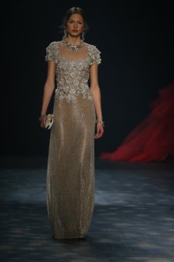 model walks the runway wearing Marchesa Fall 2016