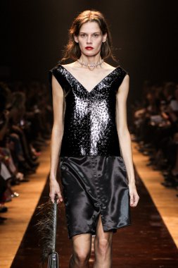 A model walks the runway during the Nina Ricci show as part of the Paris Fashion Week