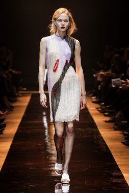 A model walks the runway during the Nina Ricci show as part of the Paris Fashion Week