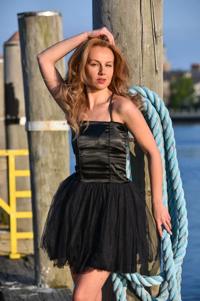 Woman in elegant black dress — Stock Photo, Image