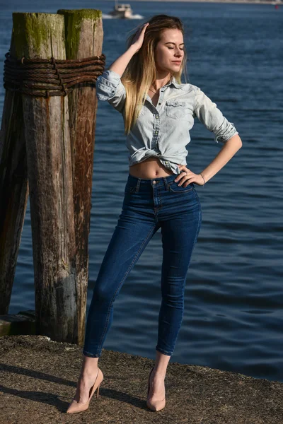 Model in denim shirt and jeans — Stock Photo, Image