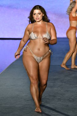 MIAMI, FLORIDA - JULY 10: Ella Halikas  walks the runway during the 2021 Sports Illustrated Swimsuit Runway Show during Paraiso Miami Beach at Mondrian South Beach on July 10, 2021 in Miami, Florida.