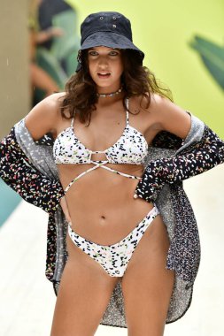 MIAMI BEACH, FLORIDA - JULY 11: A model walks for Maaji: The Spritzer House Spring '22 Runway Show during Paraiso Miami Beach at Plymouth Hotel on July 11, 2021 in Miami Beach, Florida.