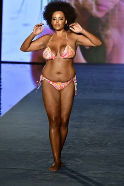 MIAMI, FLORIDA - JULY 10: Natalie Gage walks the runway during the 2021 Sports Illustrated Swimsuit Runway Show during Paraiso Miami Beach at Mondrian South Beach on July 10, 2021 in Miami, Florida.