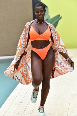 MIAMI BEACH, FLORIDA - JULY 11: A model walks for Maaji: The Spritzer House Spring '22 Runway Show during Paraiso Miami Beach at Plymouth Hotel on July 11, 2021 in Miami Beach, Florida.