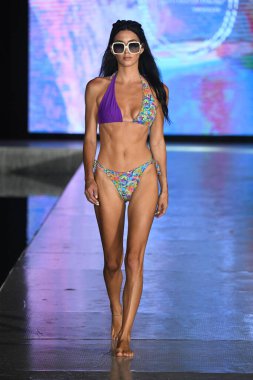 MIAMI BEACH, FLORIDA - JULY 08: A model walks the runway  for Tamarindo Show during Miami Swim Week The Shows powered by DCSW on July 08, 2021 in Miami Beach, Florida