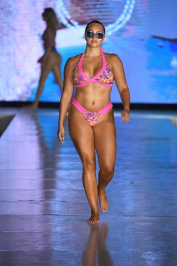 MIAMI BEACH, FLORIDA - JULY 08: A model walks the runway  for Tamarindo Show during Miami Swim Week The Shows powered by DCSW on July 08, 2021 in Miami Beach, Florida