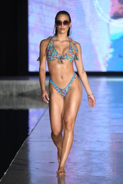 MIAMI BEACH, FLORIDA - JULY 08: A model walks the runway  for Tamarindo Show during Miami Swim Week The Shows powered by DCSW on July 08, 2021 in Miami Beach, Florida