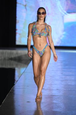 MIAMI BEACH, FLORIDA - JULY 08: A model walks the runway  for Tamarindo Show during Miami Swim Week The Shows powered by DCSW on July 08, 2021 in Miami Beach, Florida
