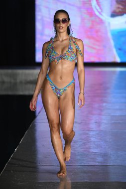 MIAMI BEACH, FLORIDA - JULY 08: A model walks the runway  for Tamarindo Show during Miami Swim Week The Shows powered by DCSW on July 08, 2021 in Miami Beach, Florida