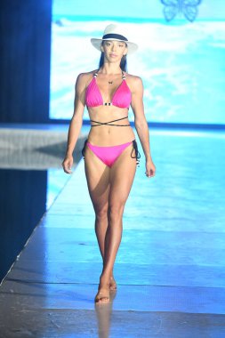 MIAMI BEACH, FLORIDA - JULY 08: A model walks the runway for Olga Niknoza Show during Miami Swim Week The Shows powered by DCSW on July 08, 2021 in Miami Beach, Florida
