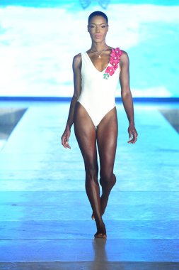 MIAMI BEACH, FLORIDA - JULY 08: A model walks the runway for Olga Niknoza Show during Miami Swim Week The Shows powered by DCSW on July 08, 2021 in Miami Beach, Florida