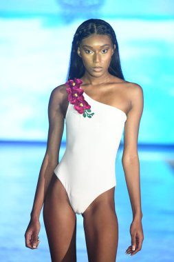 MIAMI BEACH, FLORIDA - JULY 08: A model walks the runway for Olga Niknoza Show during Miami Swim Week The Shows powered by DCSW on July 08, 2021 in Miami Beach, Florida