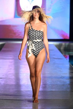 MIAMI BEACH, FLORIDA - JULY 08: A model walks the runway for DELYX LTD Show during Miami Swim Week The Shows powered by DCSW on July 08, 2021 in Miami Beach, Florida